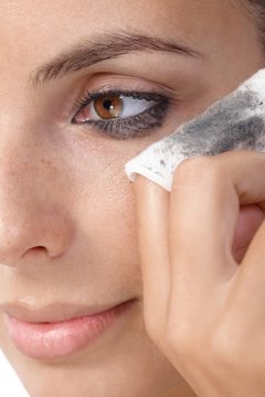 Closeup Photo Of Removing Eye Makeup