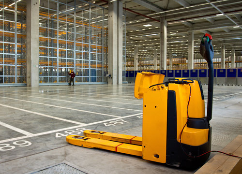 Electric forklift in storehouse