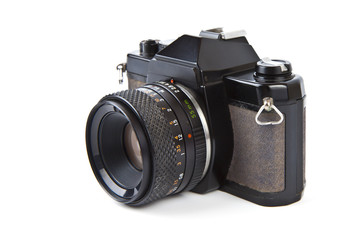 Old film camera with lens