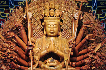 Golden wood statue of Guan Yin with 1000 hands
