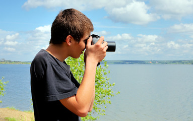 young man with camera