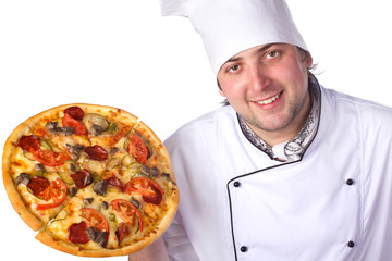 male chef holding a pizza box open