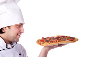 male chef holding a pizza box open