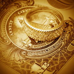 Jewelry ring and dollars