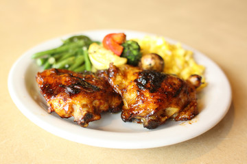 Delicious barbecue chicken with vegetables.