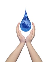 Conceptual liquid drop held in hands