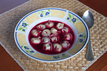 Traditional Polisch christmas borscht with dumplings