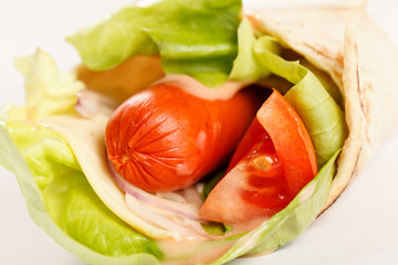 tortilla with sausage and vegetables