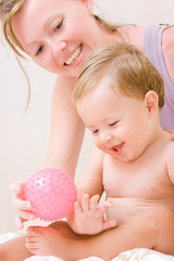 Adorable toddler with mother