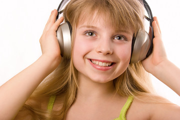 Fototapeta premium Beautiful happy girl with headphones