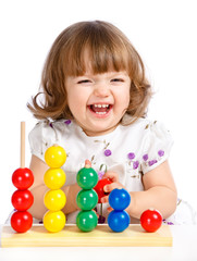 Fototapeta na wymiar little girl playing with balls