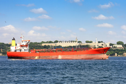 Red gas tanker sails in Bosporus