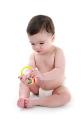 Baby playing with rattle