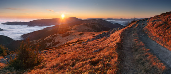 Fototapeta premium Mountain panorama at sunset with path - Low Tatras ini Slovakia