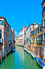 Obraz na płótnie Canvas Venice, Italy - canal, boats and houses