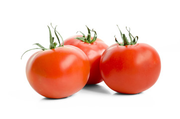 Three Red tomatos isolated on white background