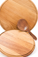 Two wooden chopping board with stand and wooden spoon