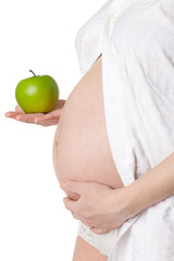 Pregnant woman with apple.