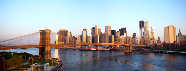 Brooklyn Bridge and Manhattan skyline in New York at sunrise