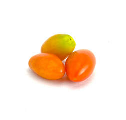 three fresh tomatoes on white background