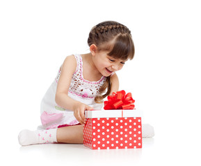 happy child girl opening gift box
