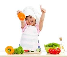 Chef girl preparing healthy food over white background