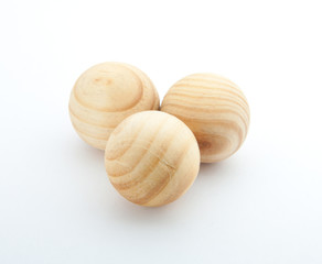 Three wooden balls.
