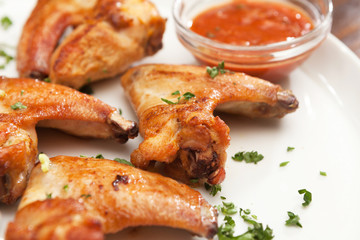 Chicken wings with sauce