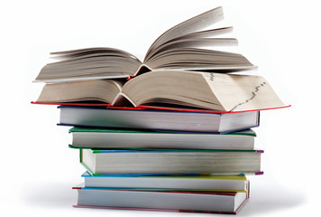 A stack of books on a white background.