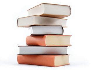 A stack of books on a white background.