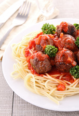 spaghetti and tomato sauce with meatballs