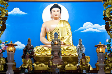 Buddha in Chinese style on altar.