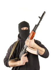 Man in mask with gun