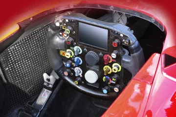 Tuinposter Steering wheel in F1 race car © Christian Delbert