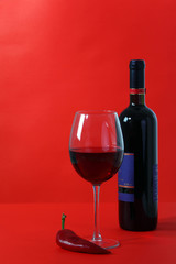 Red wine on red background