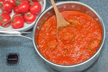 Traditional Italian Tomato Sauce and Meatballs in Pot