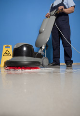 cleaning floor with machine