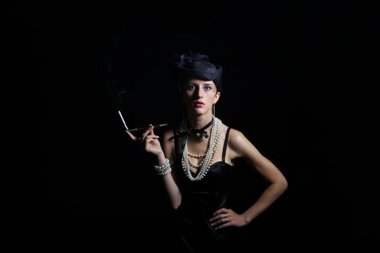 Woman with cigarette vintage hat