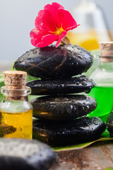 Balancing black massage stones