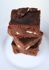 studio shot of delicious brownie on white