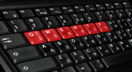 qwerty letters colored in red - obrazy, fototapety, plakaty