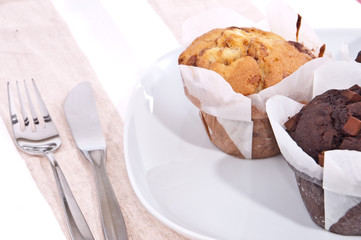 Mixed homemade muffins on a plate