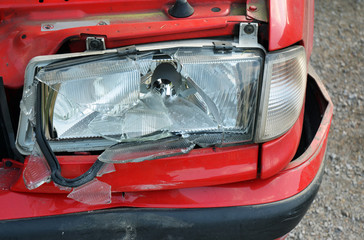 Red car crash - broken front light