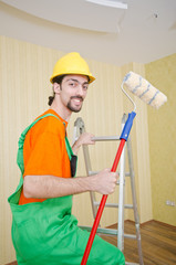 Painter worker during painting job