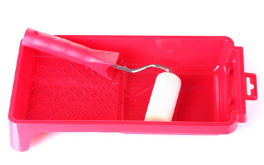 Paint roller with tray isolated on white close-up