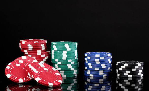Casino chips isolated on black