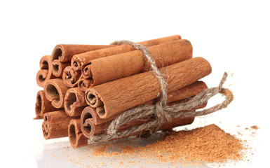 Cinnamon sticks and powder isolated on white