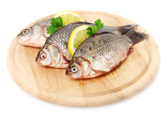Fresh fishes with lemon and parsley