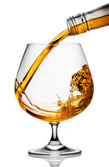 The glass with splashes brandy