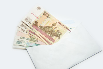 many rouble bills (the biggest Russian note) in an envelope